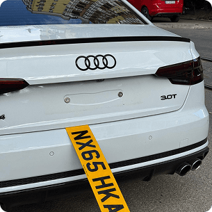 Audi with a frameless NX65 HKA plate